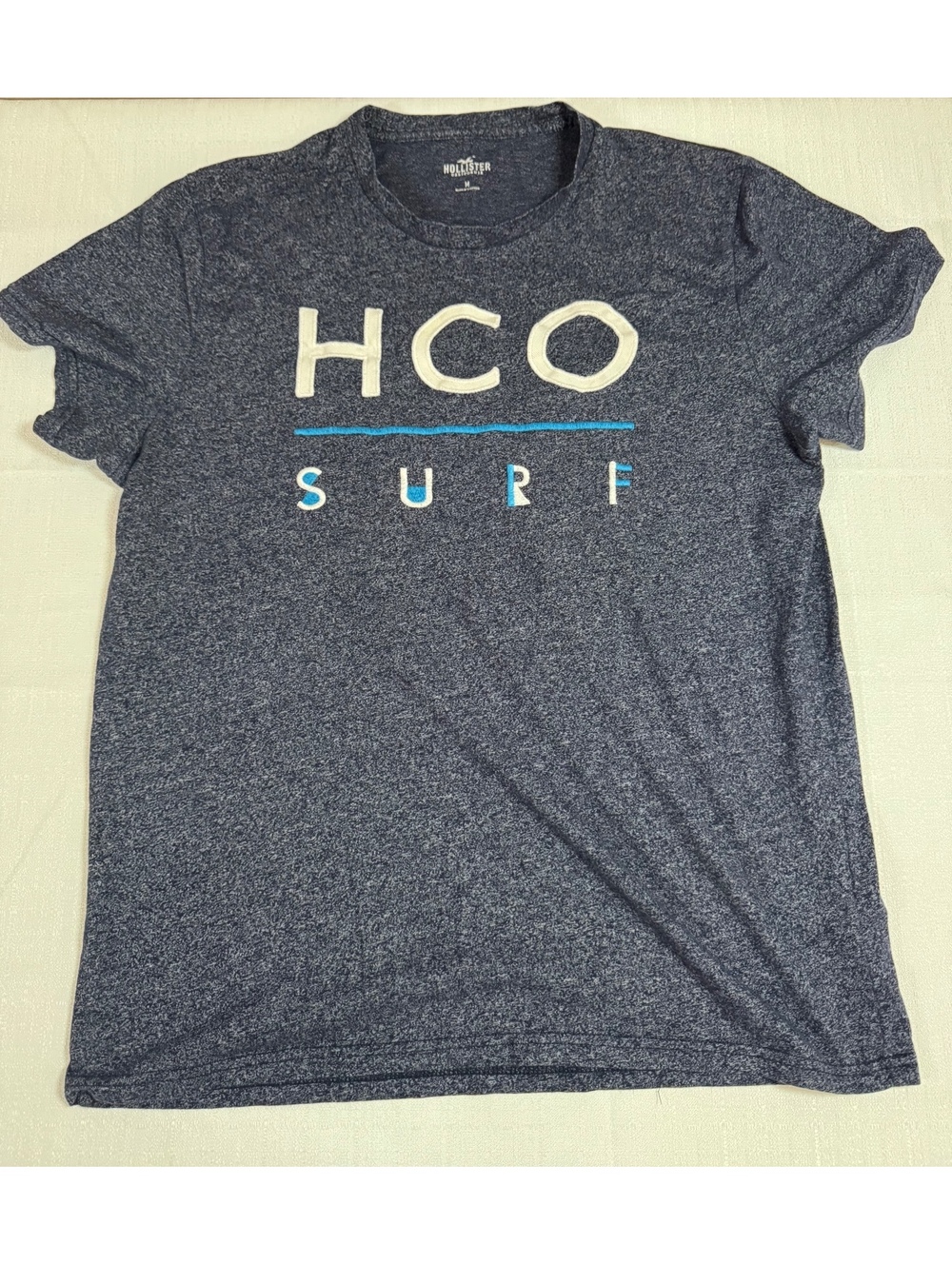Hollister HCO Surf Men’s Medium Heather Navy Blue Embroidered Graphic T-Shirt